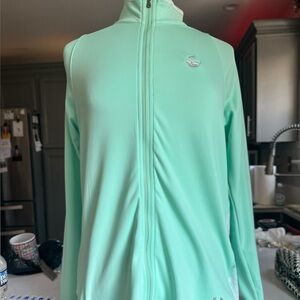 Under Armour women’s size XL cold gear zip up golf jacket